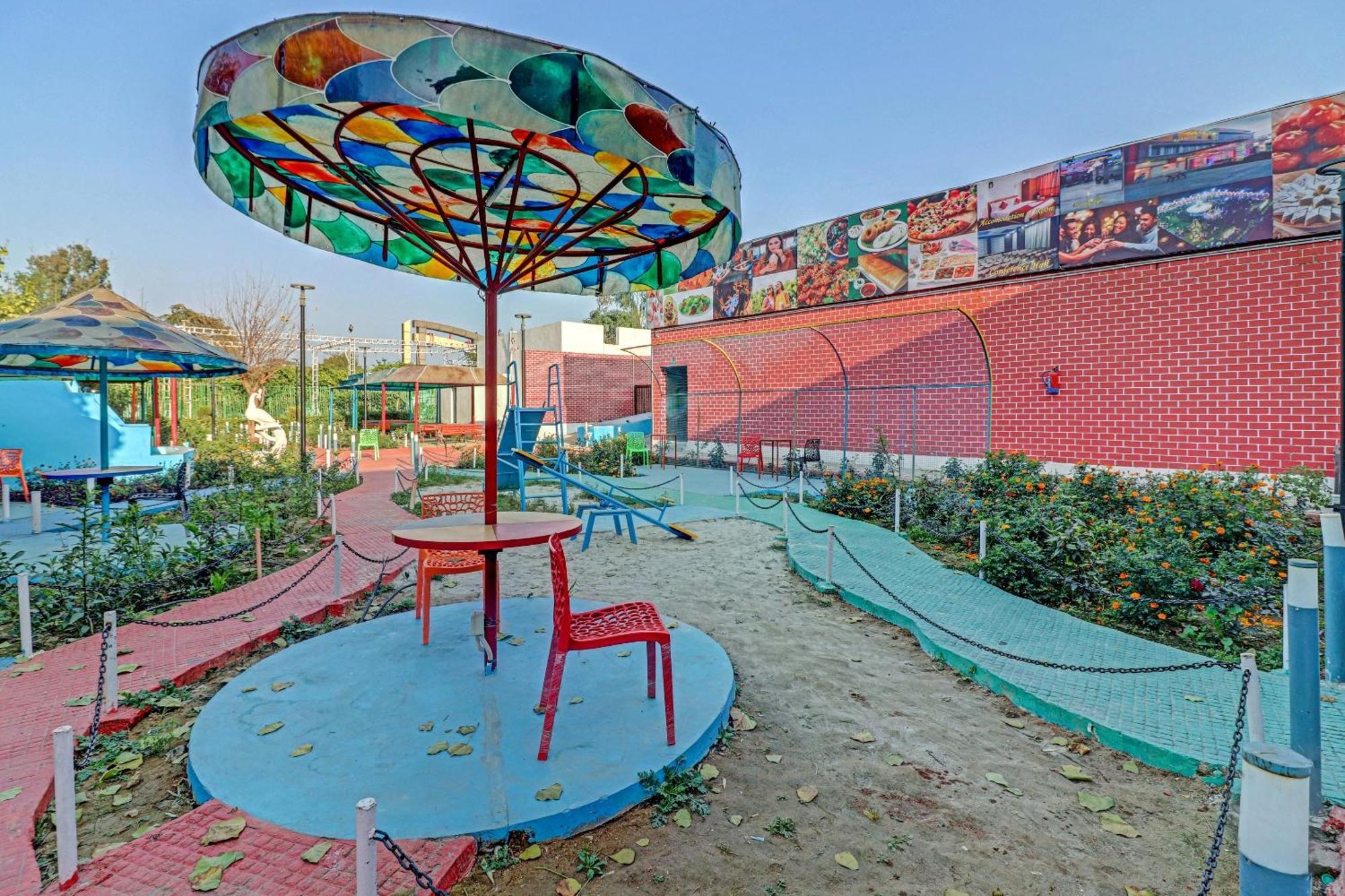 Capital O Kanha Resort Sikandra Rao Exterior photo